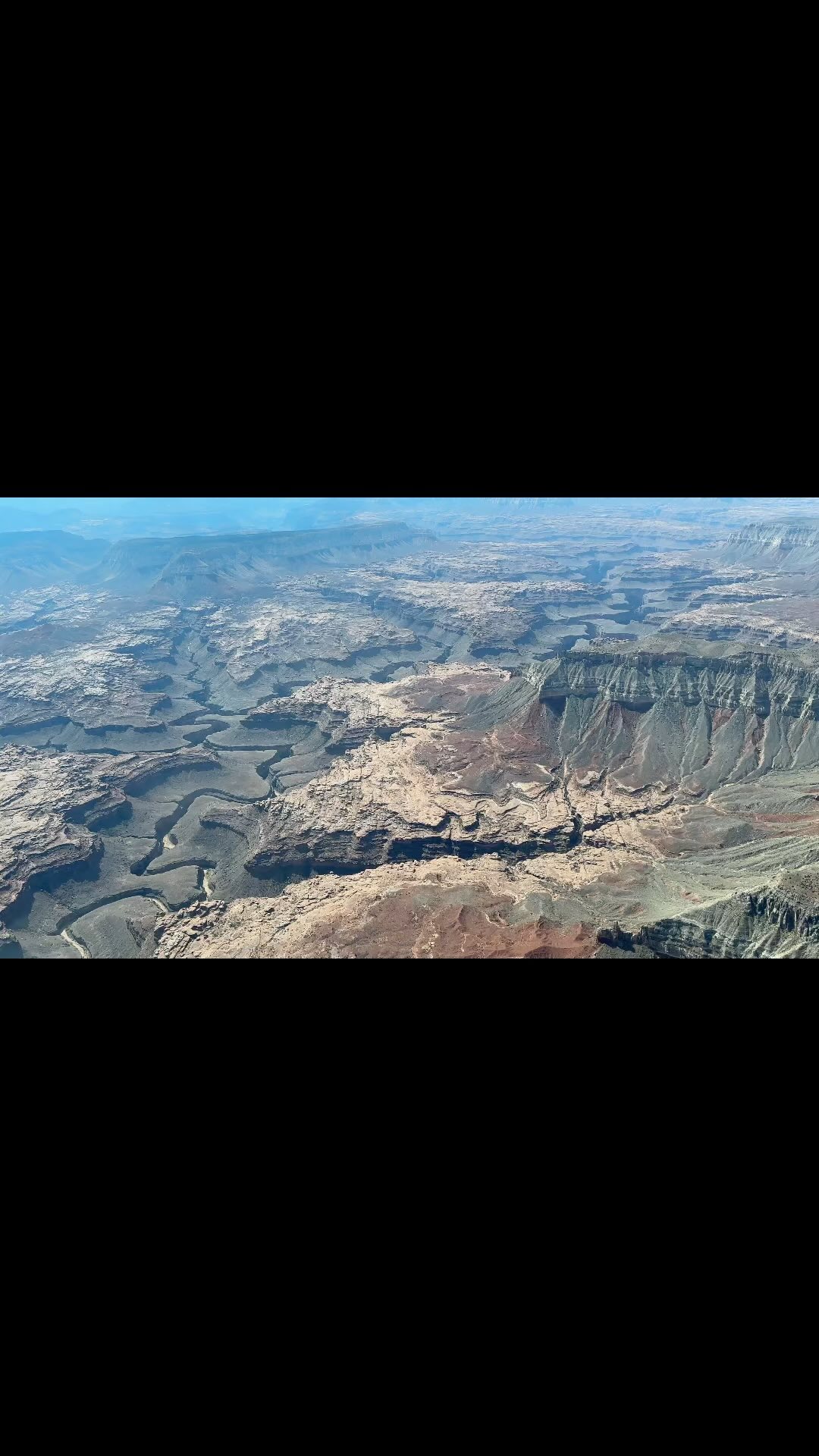 An aerial view over Kanab Canyon in Grand Canyon National Park, showing the scale and rugged terrain of one of the canyon’s major northern tributaries.