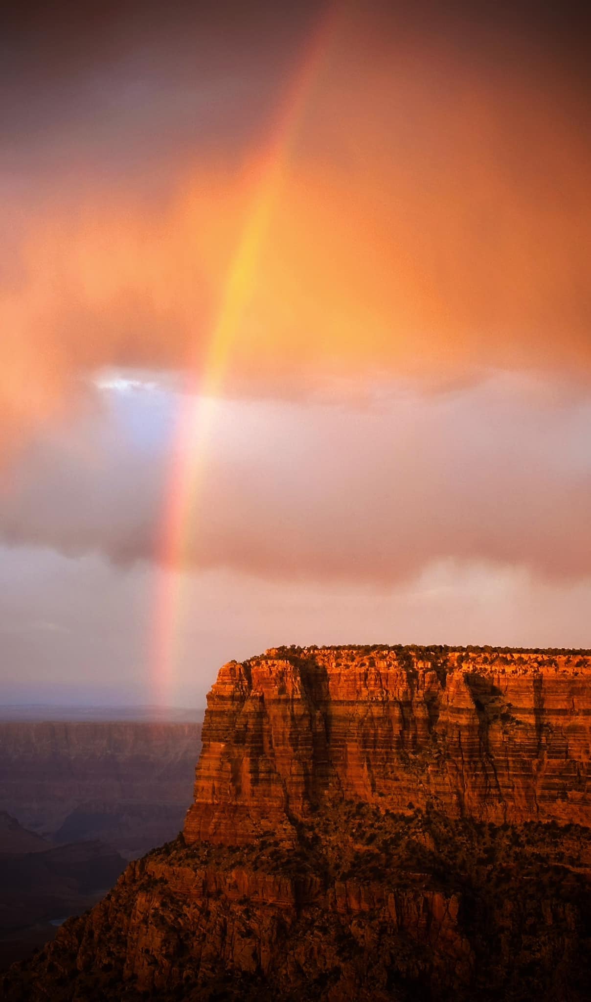 Evening rainbow over Grand Canyon