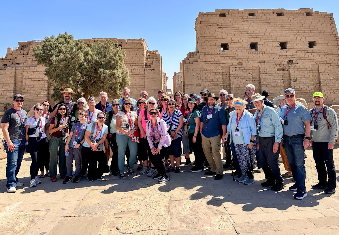 Nate Loper with a large tour group at an ancient Egyptian temple in Egypt