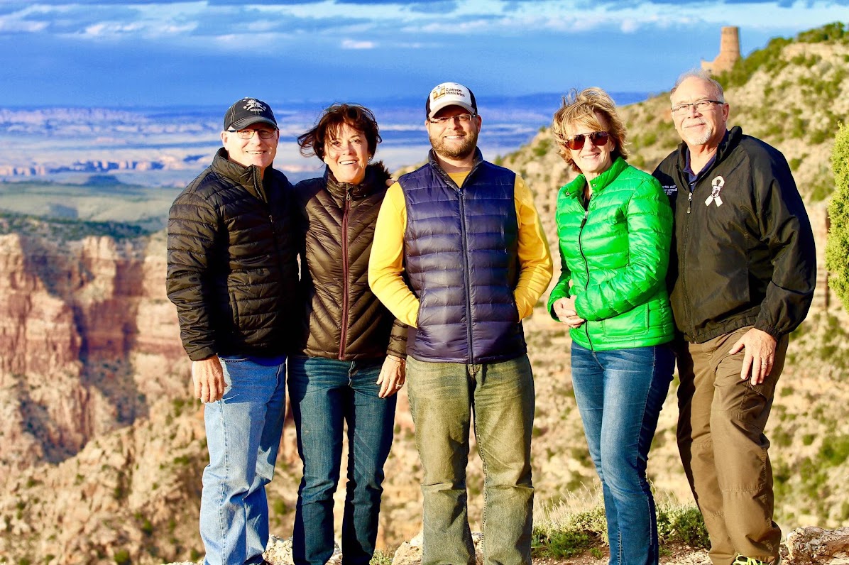 Nate Loper with a Grand Canyon Tour Group Nate Loper with four guests at a Grand Canyon overlook