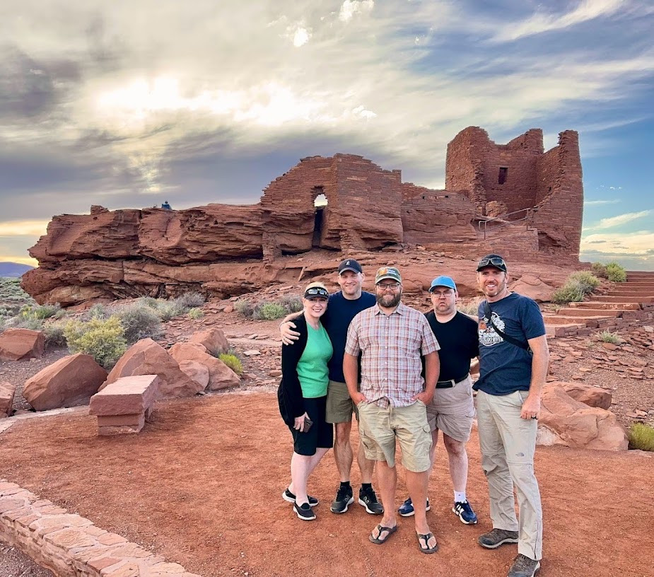 Nate Loper with a small group at an ancestral Puebloan ruin in Wupatki National Monument